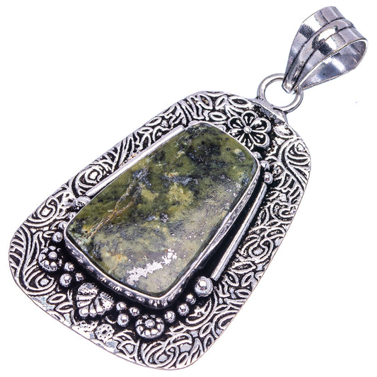 German silver unakite pendant, rectangular green stone with scrollwork frame and bail