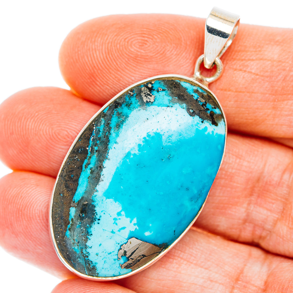 Oval turquoise pendant in .925 sterling silver with loop bail, bright blue stone