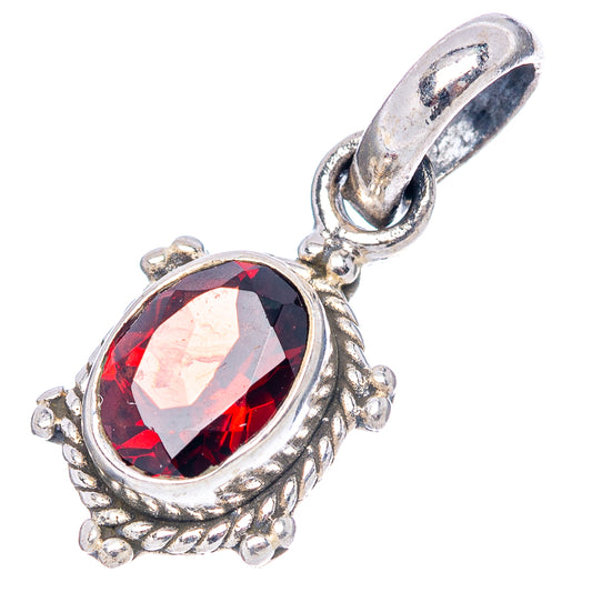 Sterling silver garnet pendant with faceted round red gemstone and bail