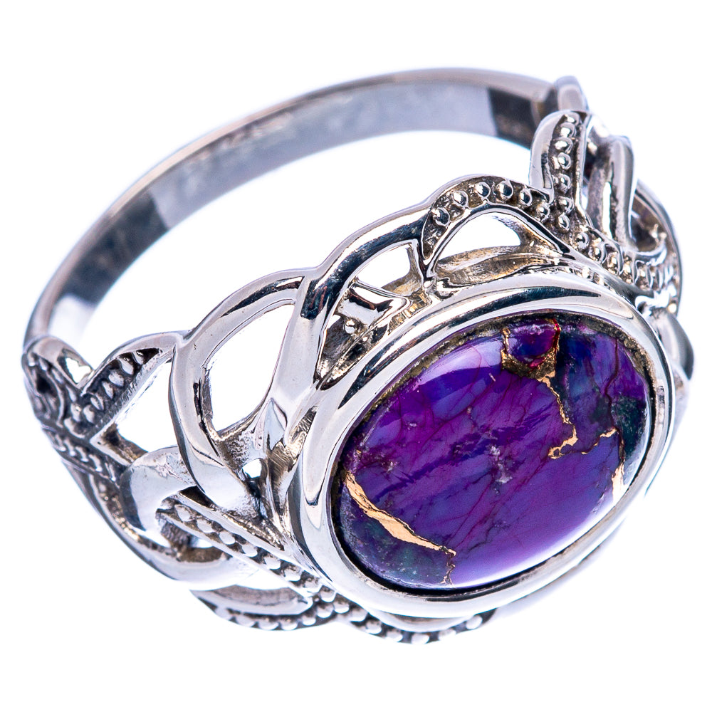 Sterling silver ring with oval purple gemstone, filigree setting and side cutouts