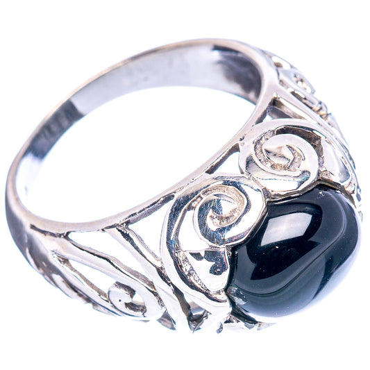 Sterling silver filigree ring, dark oval center stone and ornate scrollwork sides