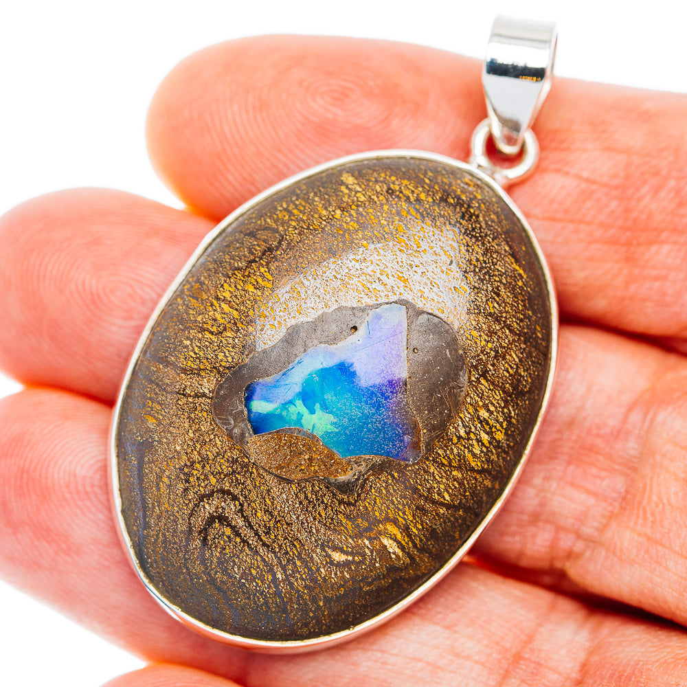 925 sterling silver boulder opal pendant with blue stone in round bezel