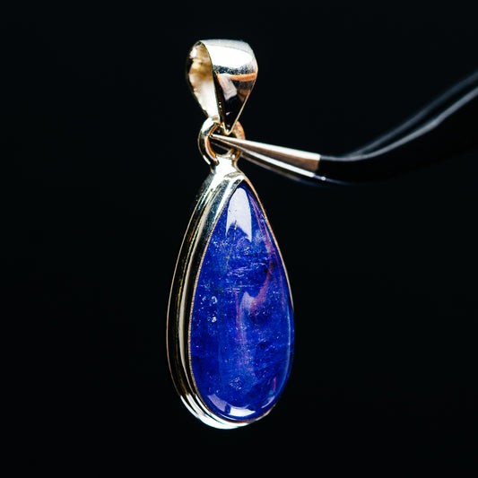 Sterling silver tanzanite pendant, blue teardrop gemstone with polished bail at top