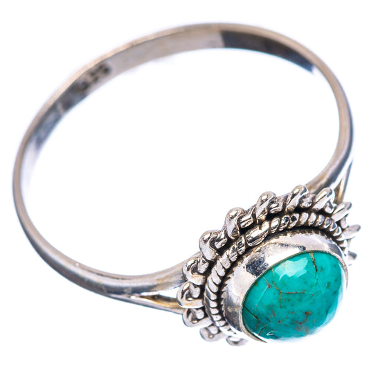 Sterling silver turquoise oval ring with carved border, side view