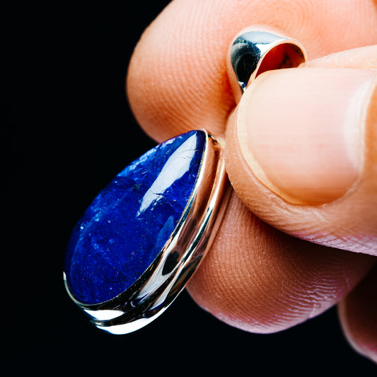 Sterling silver tanzanite teardrop pendant close-up with blue gemstone