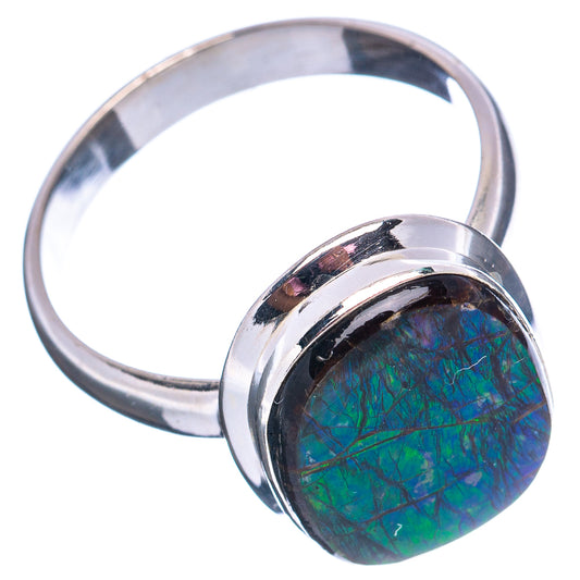 Polished sterling silver ammolite ring with oval green iridescent stone, side view