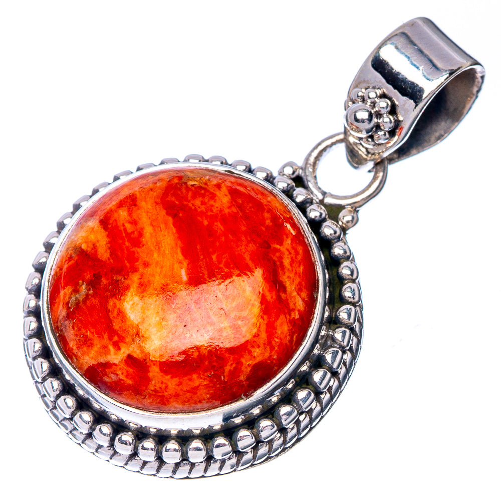 Sterling silver sponge coral pendant with orange cabochon, textured bezel, and bail