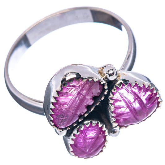 Sterling silver open-band ring with three purple carved teardrop gemstones, side view