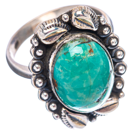 Turquoise oval cabochon sterling silver ring, decorative leaf setting and round bead bezel
