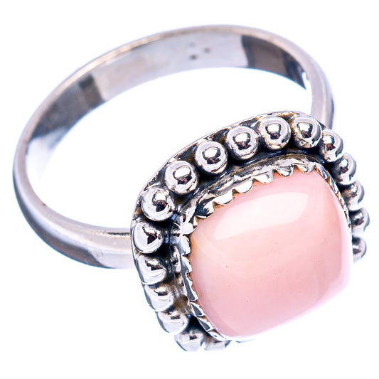Pink opal cabochon ring in .925 sterling silver with beaded halo setting