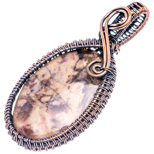 Oxidized copper wire-wrap pendant with teardrop stone, spiral wraps and loop bail