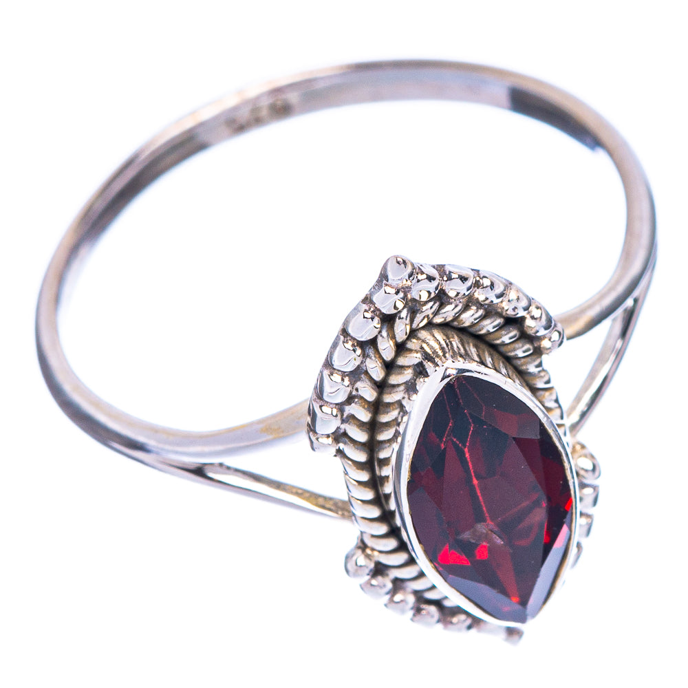 Dainty garnet ring, silver band with oval dark-red gemstone and raised patterned sides