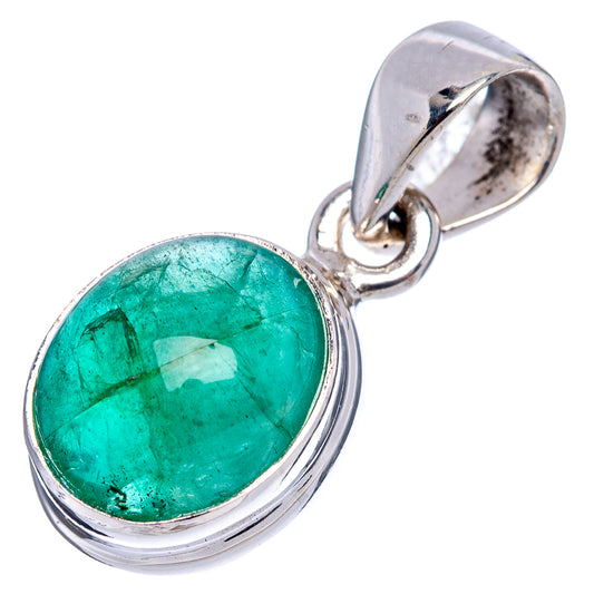Sterling silver emerald pendant with oval bezel and round green cabochon gemstone