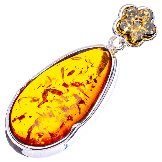 Yellow amber teardrop pendant with flower bail in .925 sterling silver