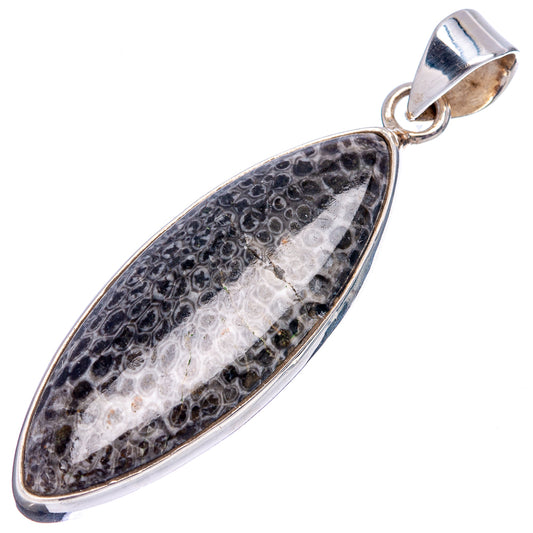 Teardrop sterling silver pendant with dark mottled stone-like inlay and top bail