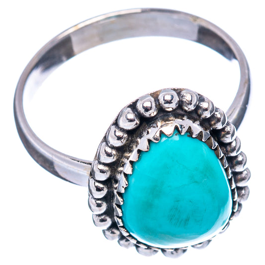 Sterling silver turquoise teardrop ring with raised bead border and bezel setting