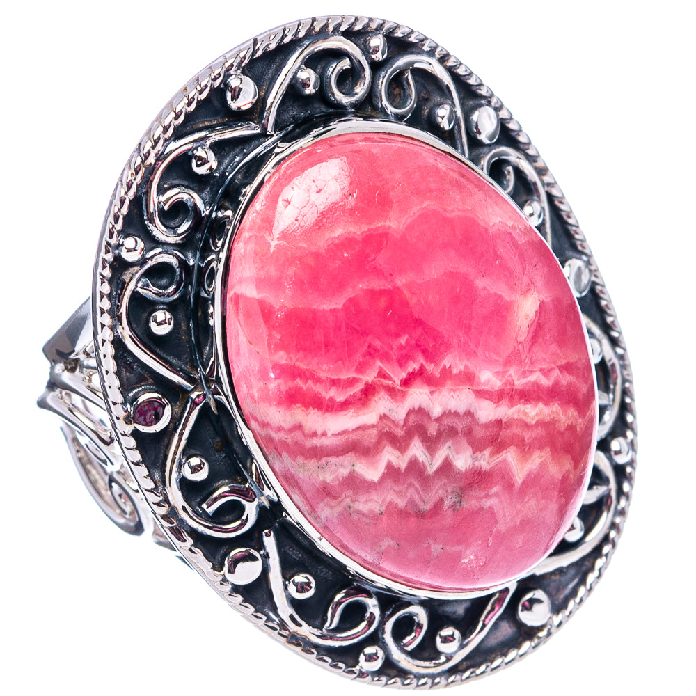 Oval pink rhodochrosite sterling silver ring with ornate filigree bezel