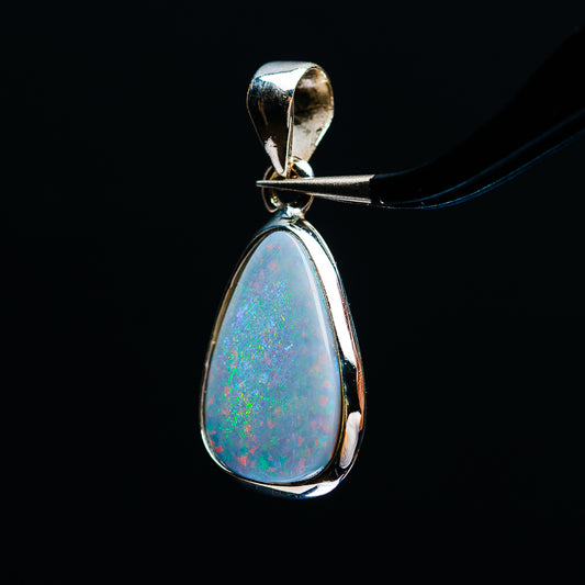 Sterling silver fire opal teardrop pendant, open bezel and split bail on chain