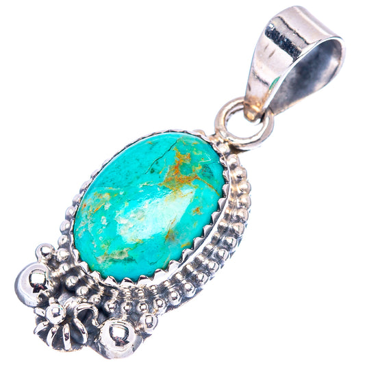 Turquoise oval pendant with ornate silver rosette bezel and ring bail, .925 sterling