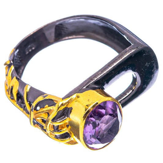 Amethyst oval ring in black and gold, raised bezel with engraved band details