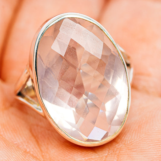 Faceted oval rose quartz ring in .925 sterling silver, side angle on skin