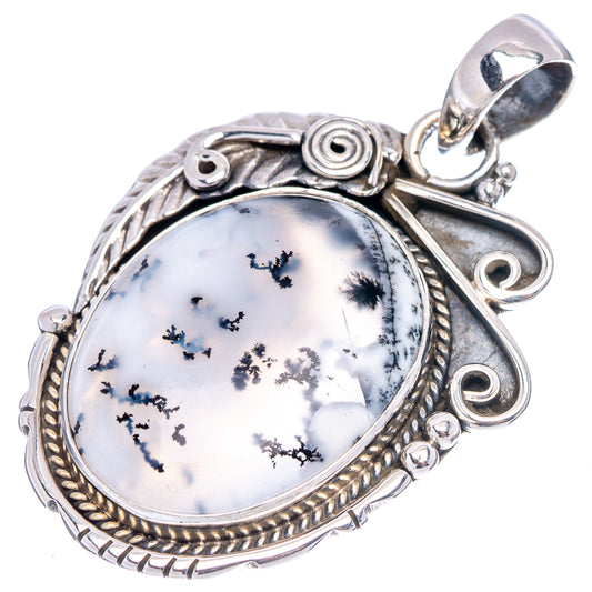 Sterling silver oval dendrite opal pendant with etched border and loop bail.
