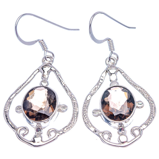 Sterling silver smoky quartz teardrop earrings with faceted stone and hanging loop