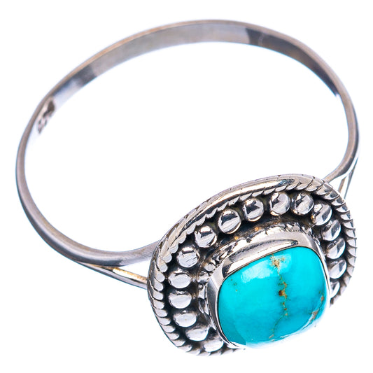 Turquoise oval sterling silver ring with raised bezel and beaded edge