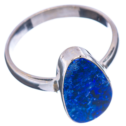 Sterling silver ring with blue oval opal gemstone, open-top band profile
