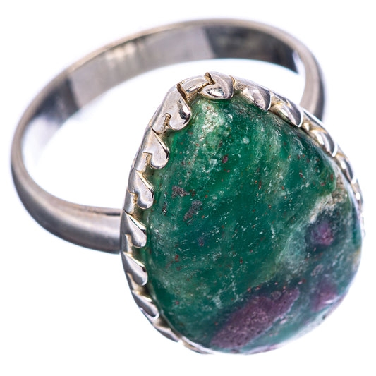 Sterling silver band ring with oval green stone, prong setting, purple inclusions, size 6.75.