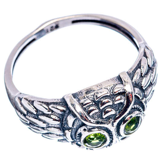 Sterling silver peridot owl ring with round green stone and carved band