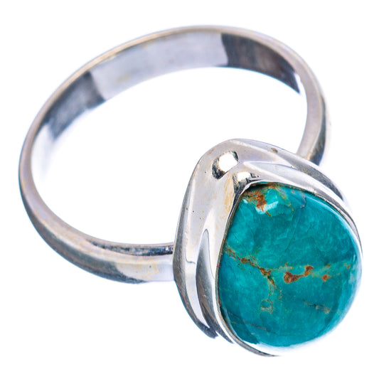 Oval turquoise cabochon ring with .925 sterling silver band and open prong setting