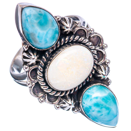 Side view sterling silver ring with filigree setting and three oval blue-and-white stones, size 10.