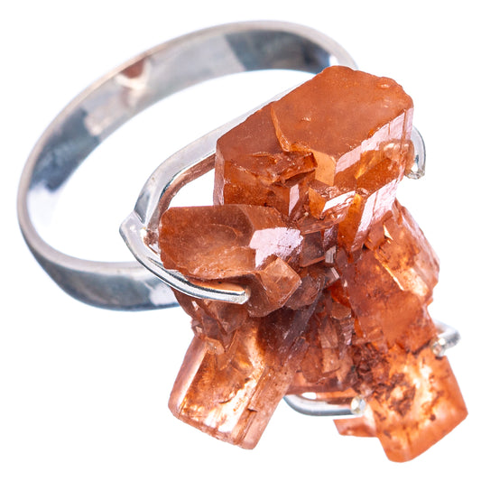 Orange aragonite cluster ring on .925 sterling silver band with prong-set stones