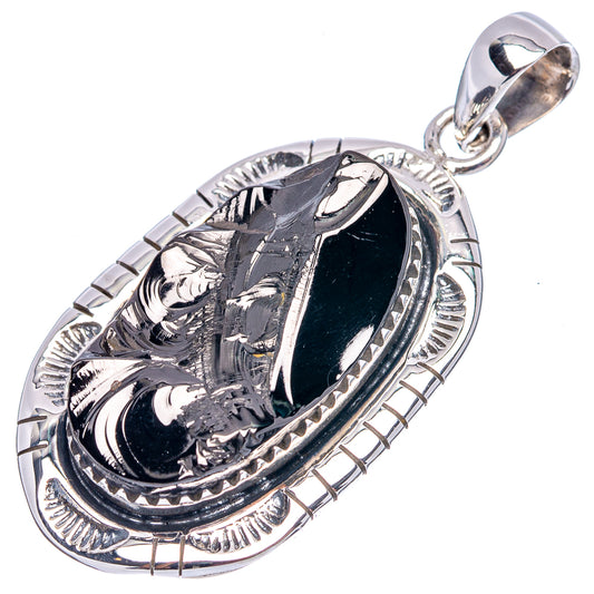 Oval shungite pendant with black gemstone and ornate .925 sterling silver border and bail