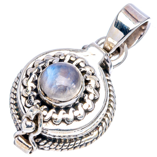 Sterling silver moonstone pendant with ornate bezel and round blue-lavender cabochon