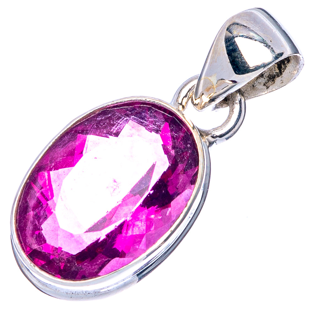 Oval faceted pink fluorite pendant in polished sterling silver setting with bail