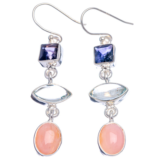 Sterling silver earrings with square dark stones, pink oval drops, and light blue charms
