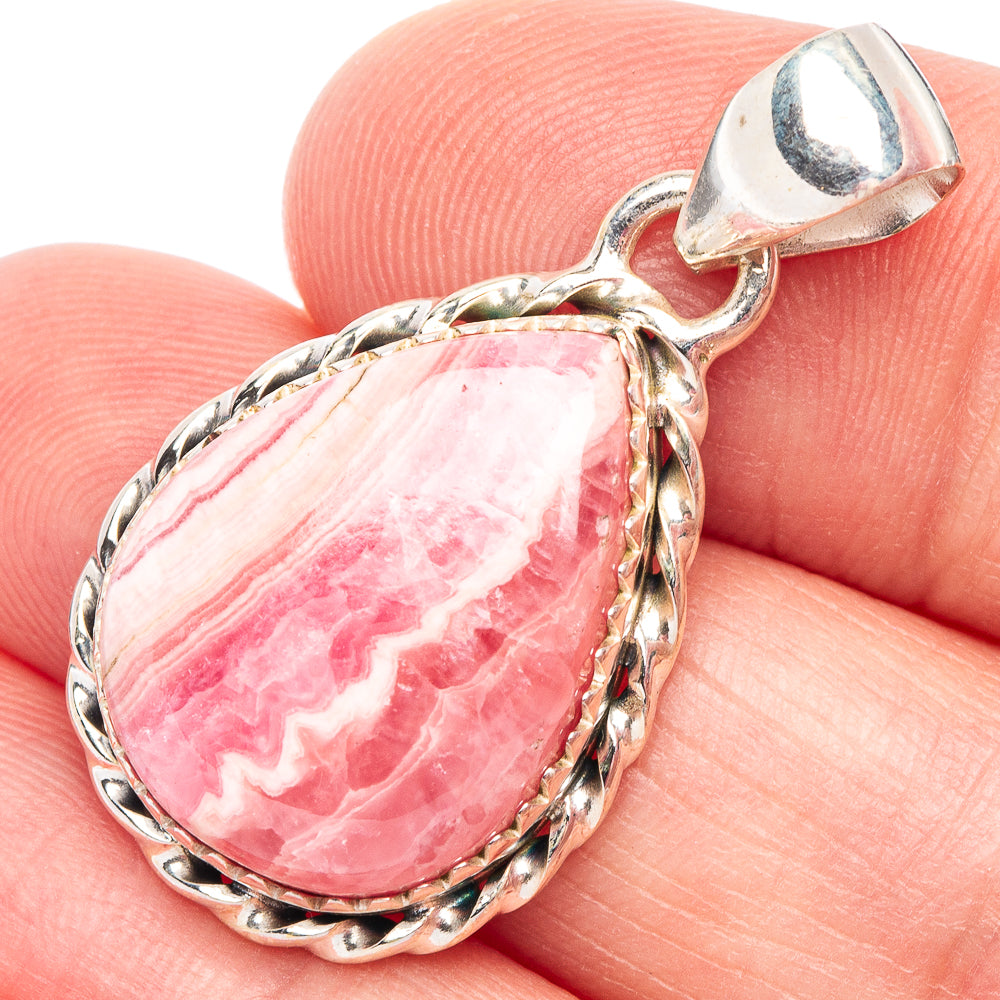 Oval rhodochrosite pendant in 925 sterling silver with pink stone and ornate bezel
