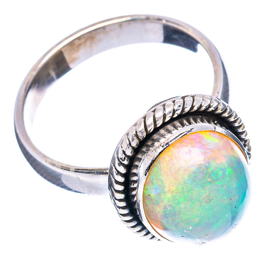 Sterling silver opal ring, side view of band and bezel with iridescent light opal