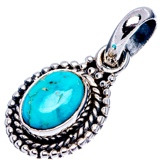 Turquoise oval pendant with ornate beadwork border and sterling silver loop bail