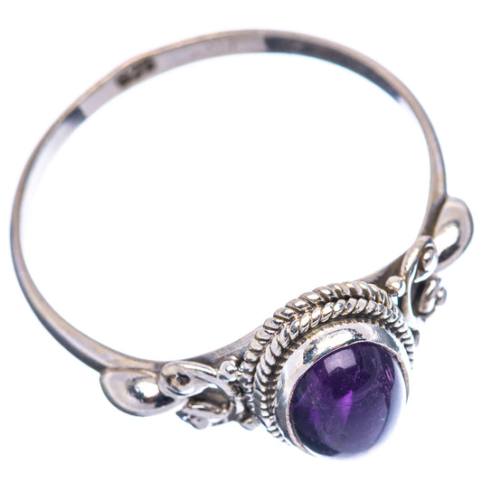 Oval amethyst gemstone ring in sterling silver with rope-edged bezel