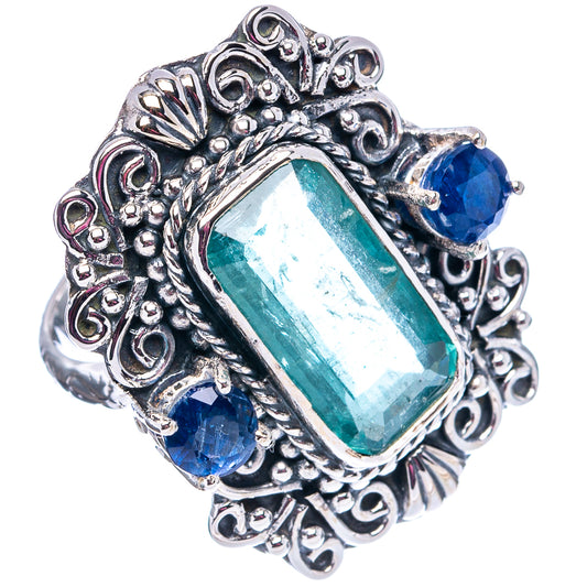 Sterling silver ring showing teal-green rectangular stone and blue side stones