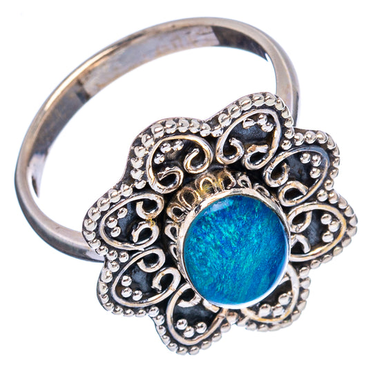 Sterling silver ring with blue opal center, detailed side filigree and rounded band