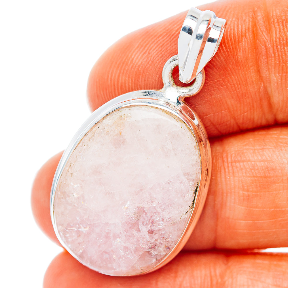 Sterling silver kunzite pendant with oval pink gemstone bezel and hinged bail