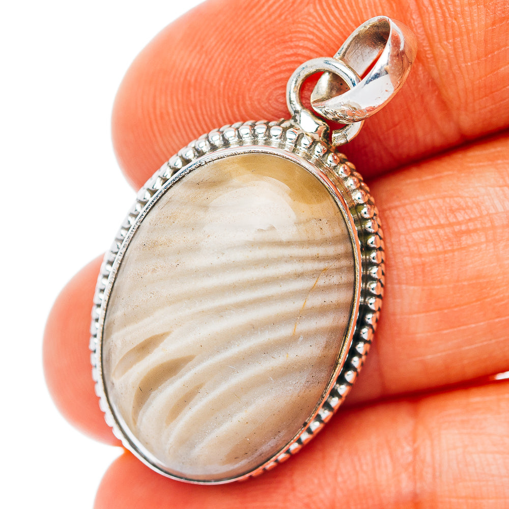 Oval striped flint pendant in .925 sterling silver bezel with top bail loop