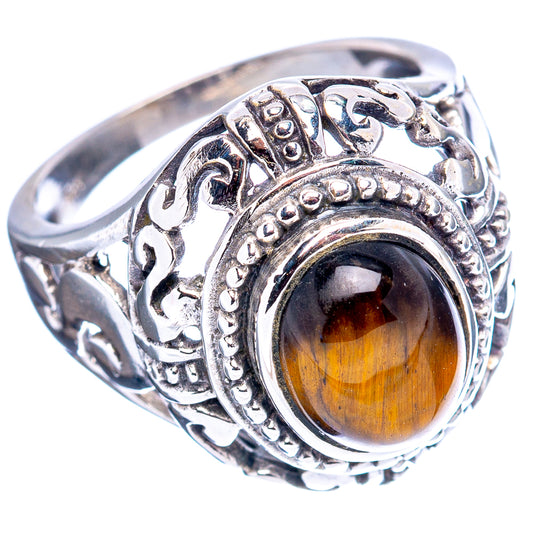Sterling silver filigree ring with tiger's eye gemstone and engraved side details, size 7.