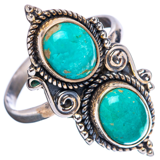 Adjustable .925 sterling silver ring with two oval turquoise cabochons in filigree