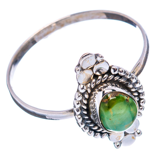 Sterling silver ring with green turquoise oval cabochon, scalloped bezel, and small beads
