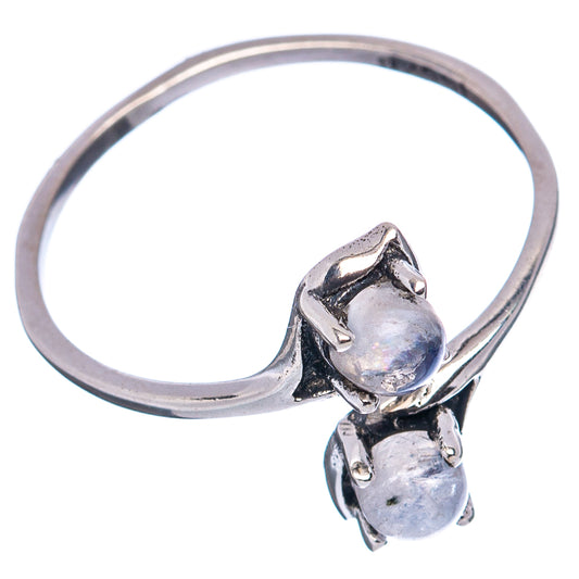 Sterling silver opal ring with two oval stones in blackened bezel prongs